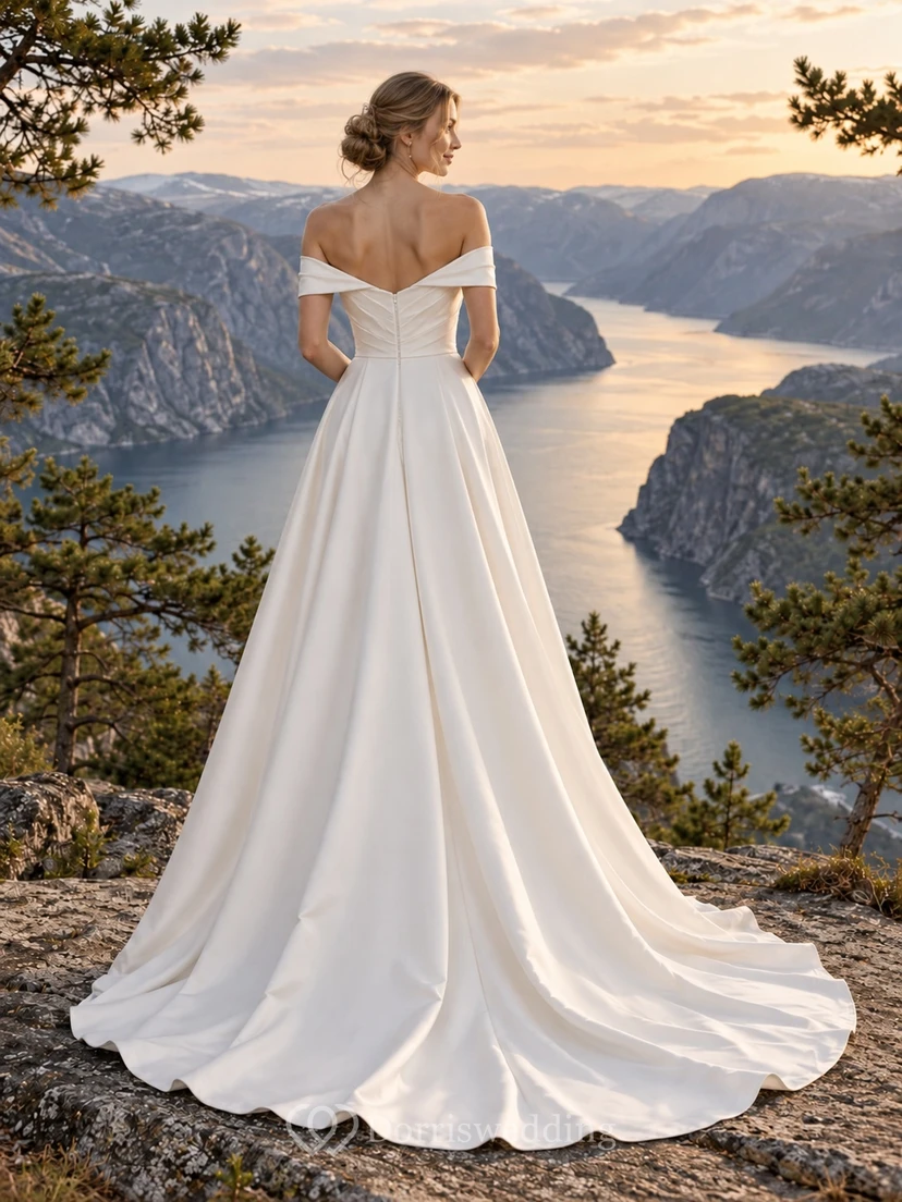 Vestido de novia de satén con escote Bardot, corte en A, corpiño cruzado simulado y cola redondeada. view 2