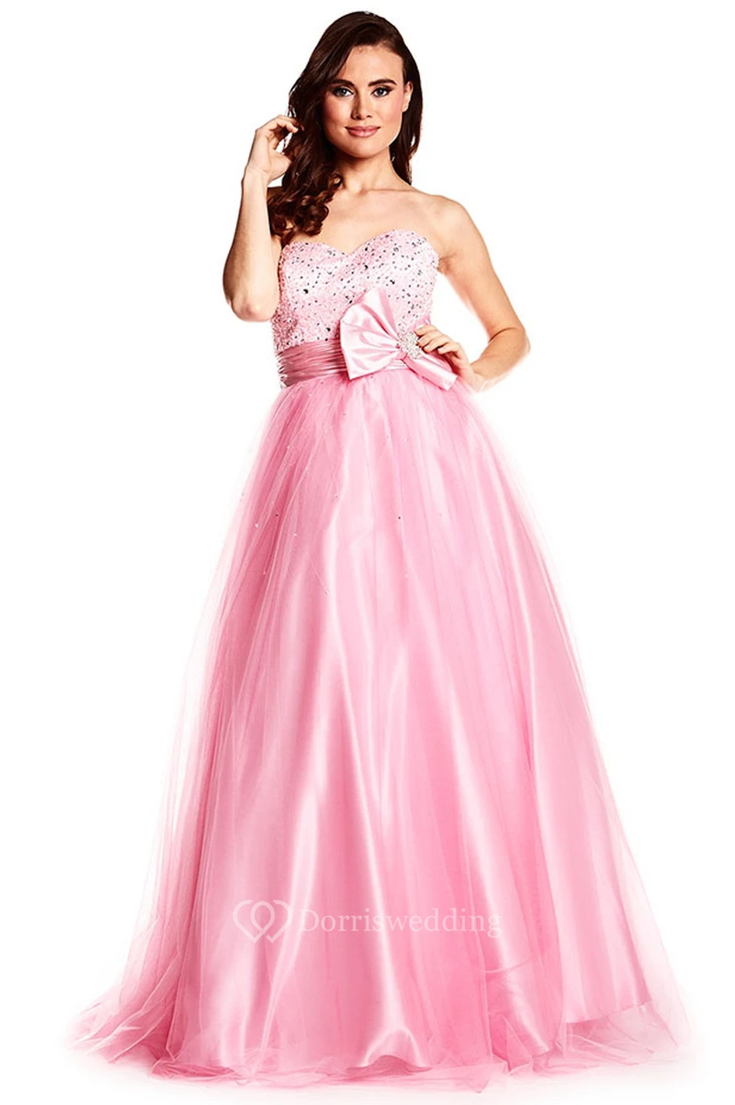 Vestido de fiesta largo de tul y satén sin mangas con lentejuelas, escote corazón y corte en A, con lazo.