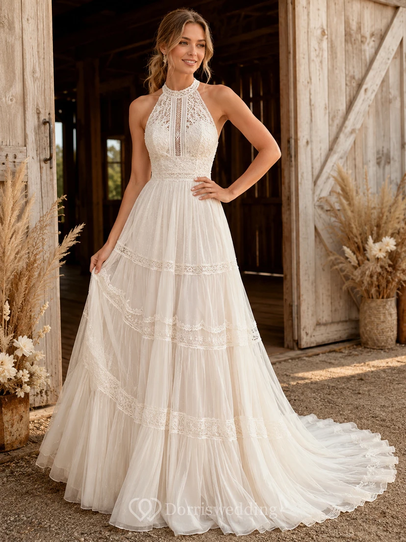 Robe de mariée chapelle en tulle dos nu à volants et dentelle, coupe trapèze