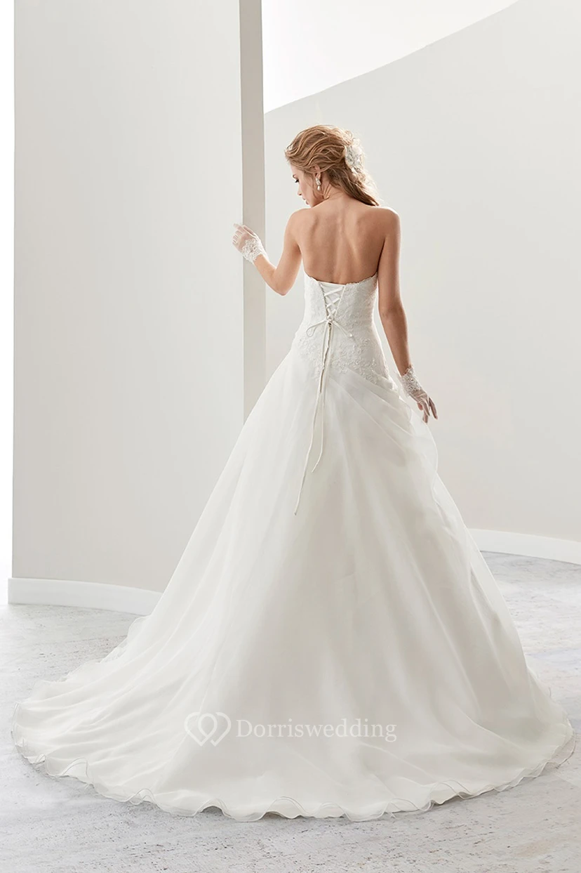 Sweetheart A-Line Lace Bridal Gown With Asymmetrical Ruffles Overlayer And Lace-Up Back view 2