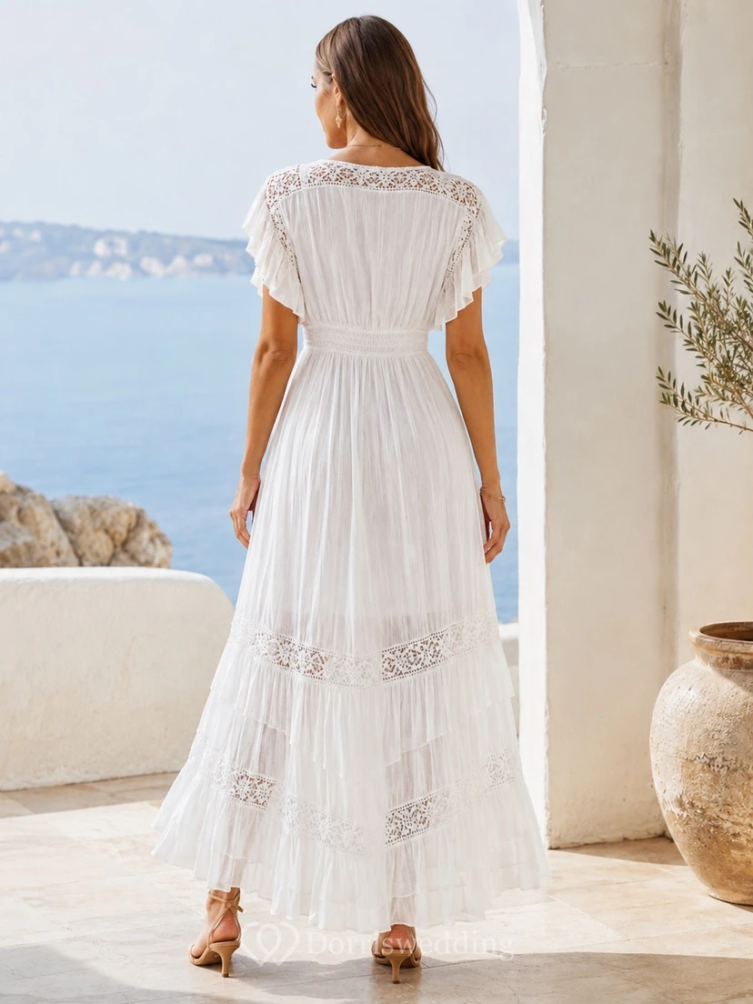 Vestido bohemio blanco de encaje con escote en V, manga corta y largo hasta los tobillos view 2