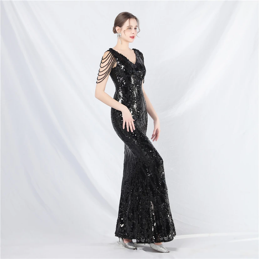 Vestido de noche largo con lentejuelas y abalorios view 39
