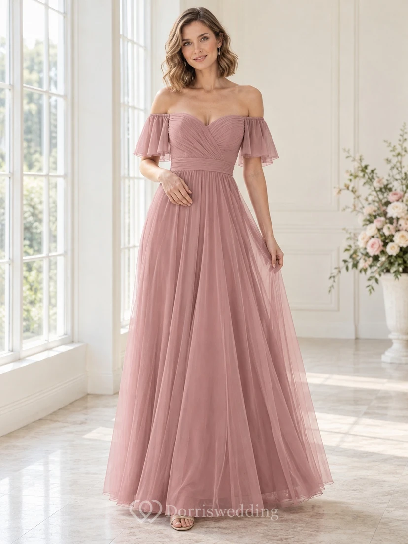 Vestido de dama de honor romántico de corte A, largo hasta el suelo, con escote corazón, mangas con volantes y volantes, color rosa empolvado.