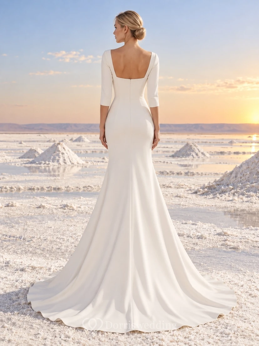 Vestido de novia sencillo con escote corazón, mangas tres cuartos, corpiño liso y cola de sirena. view 2
