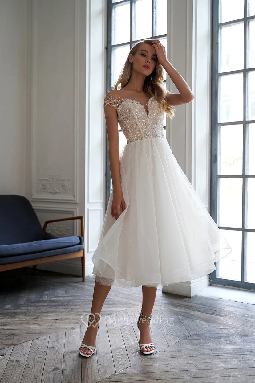 Vestido de novia de gasa con corte en A y detalles de pedrería, estilo Imperio Brillante.
