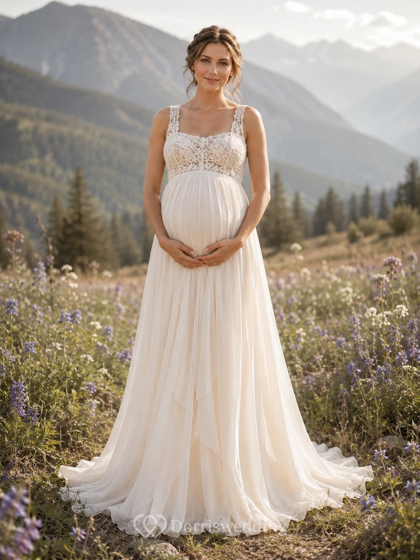 Vestido de novia premamá con escote cuadrado, tirantes de encaje, corte imperio y falda de tul.