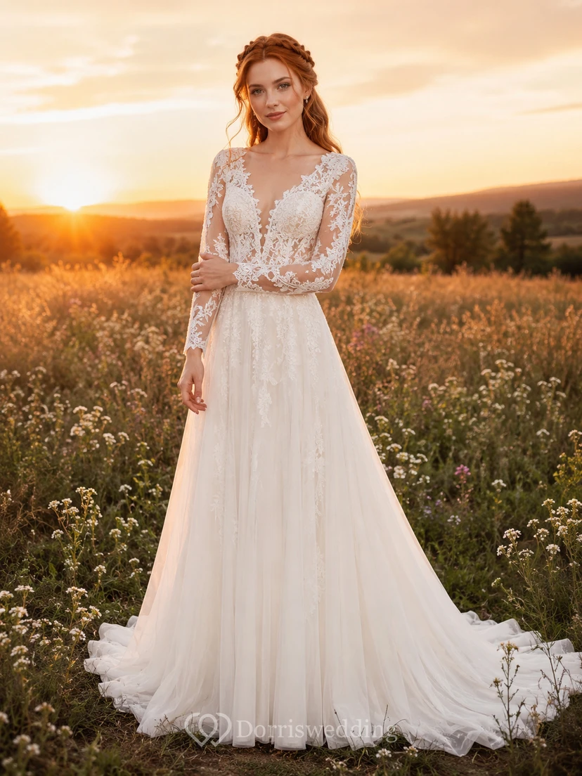 Vestido de novia bohemio de tul con espalda descubierta y mangas largas, estampado de atardecer.