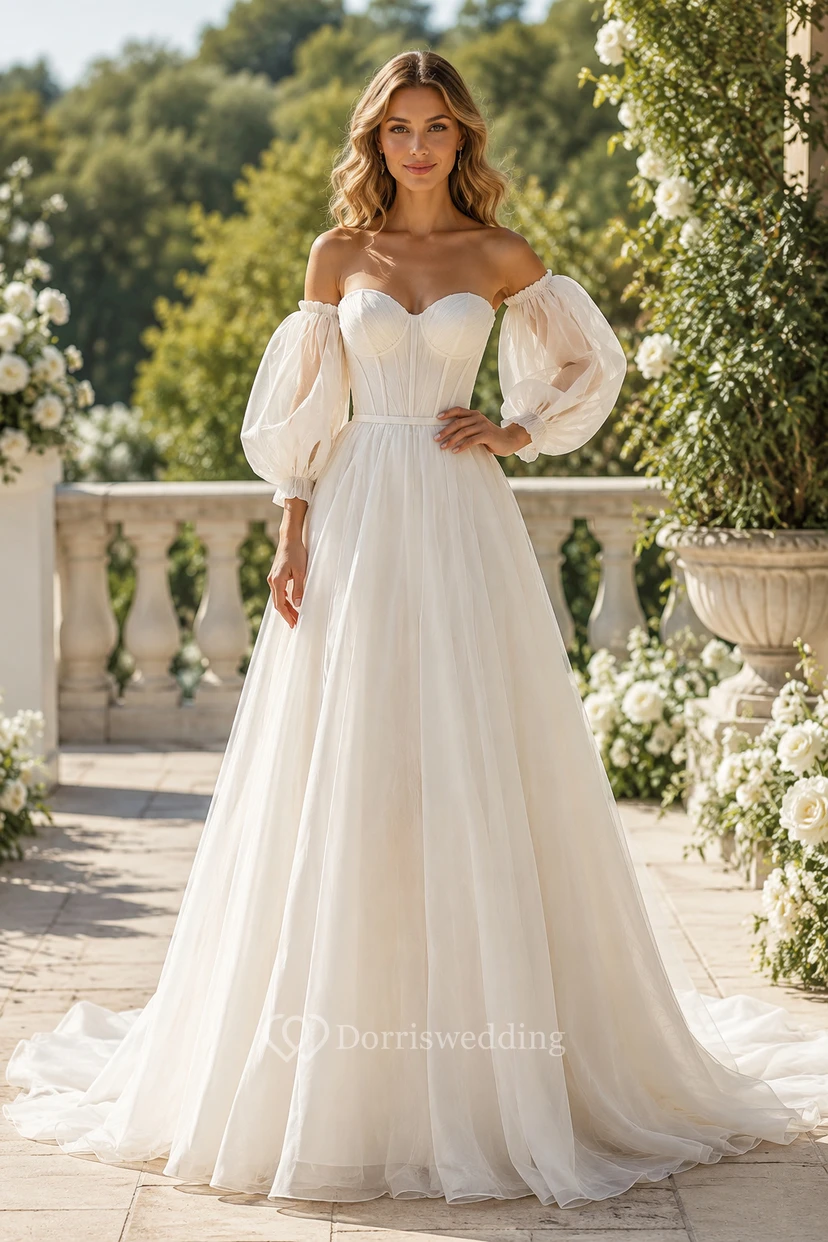 Robe de mariée en tulle trapèze à épaules dénudées et manches bouffantes