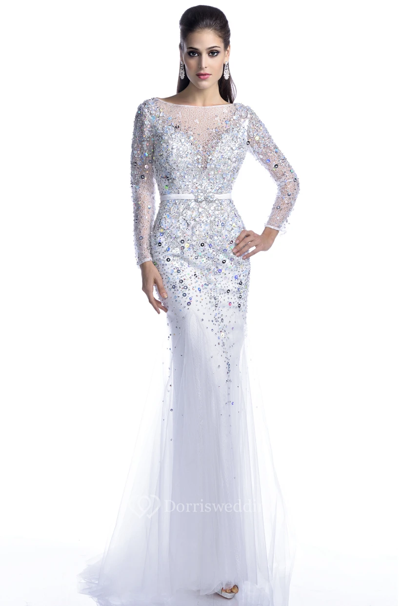 Vestido de fiesta de tul de manga larga con corte trompeta, espalda con abertura y brillantes pedrería.