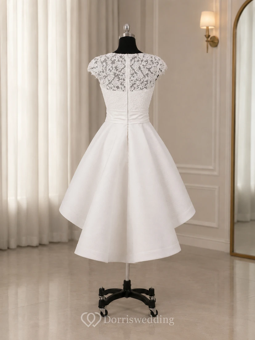 Vestido de novia de satén de corte A cuadrado, manga corta, bajo asimétrico y cremallera en la espalda. view 8