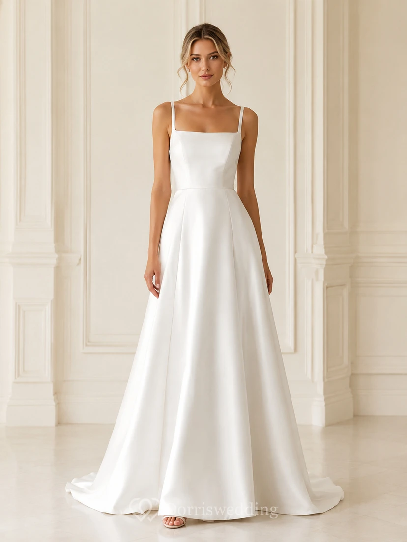 Robe de mariée longue en satin à fines bretelles, col carré et décolleté en V plongeant, fermeture éclair.