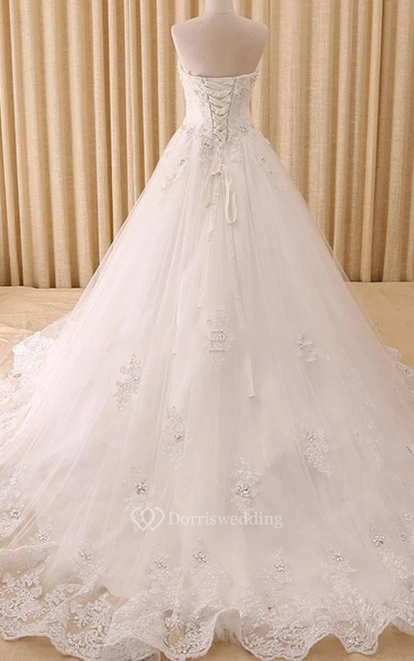 Vestido de corte A con escote corazón, pliegues acampanados, apliques de cuentas, cola de corte, cremallera, cierre de cordones en la espalda, gasa, tul, encaje, lentejuelas, organza, satén y tafetán. view 2