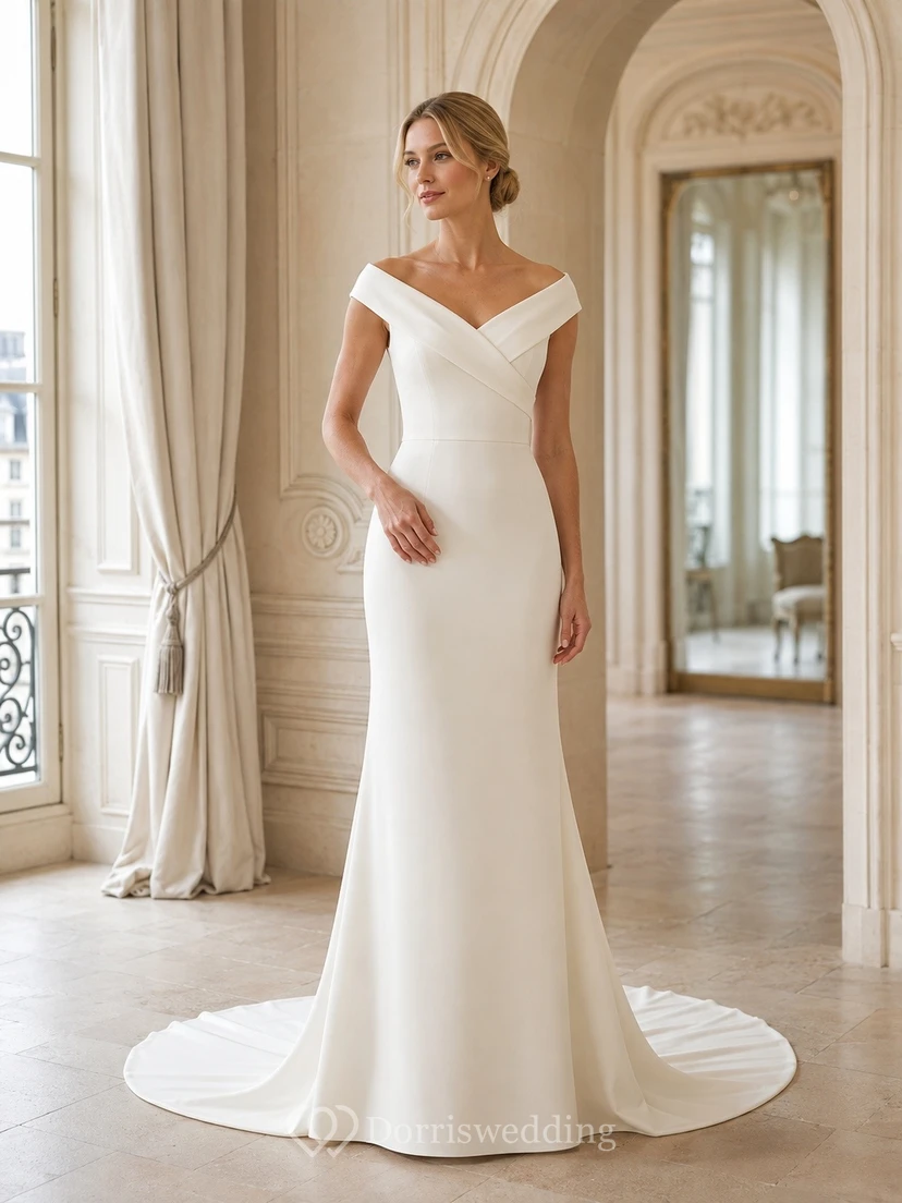Vestido de novia minimalista sencillo estilo sirena con escote Bardot y cola larga.
