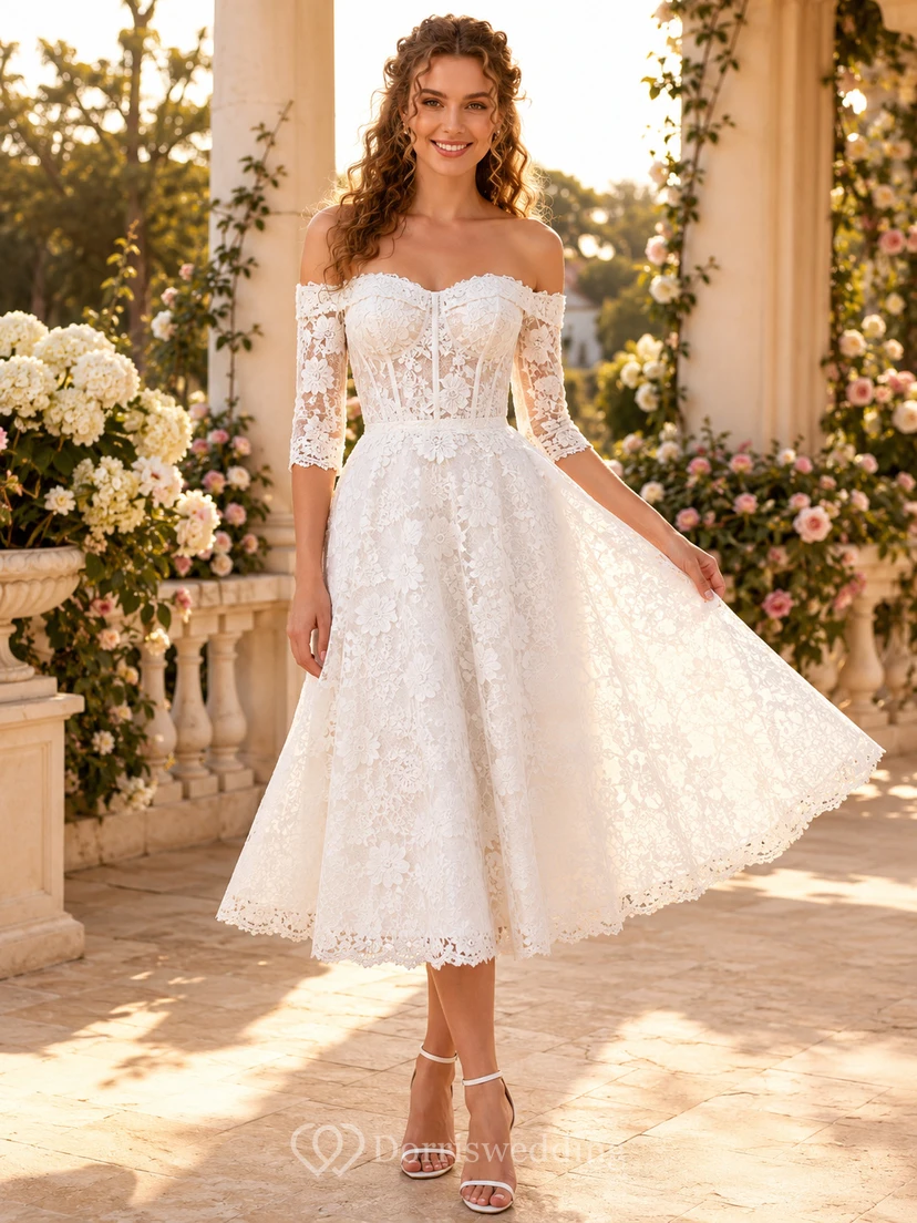 Robe de mariée romantique vintage en dentelle, coupe trapèze, épaules dénudées, manches courtes, épaules dénudées, longueur thé, idéale pour renouveler ses vœux.
