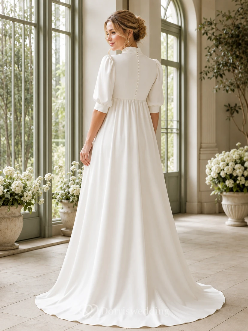 Robe de mariée moderne et pudique de maternité, col montant, manches bouffantes mi-longues, en satin, coupe empire, longueur au sol view 2