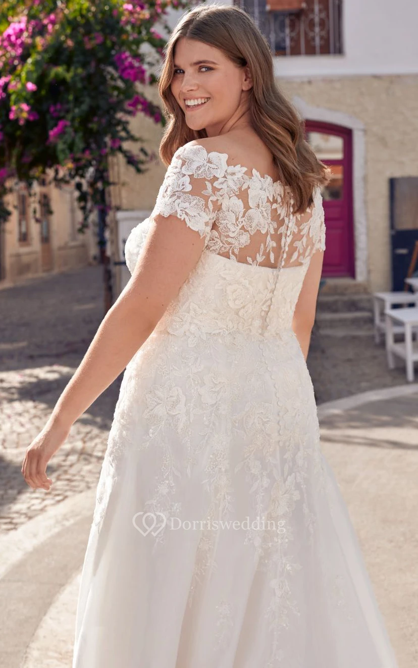 Robe de mariée élégante en satin, longue jusqu'au sol, à manches courtes, coupe trapèze, dos nu, ornée d'appliqués view 2