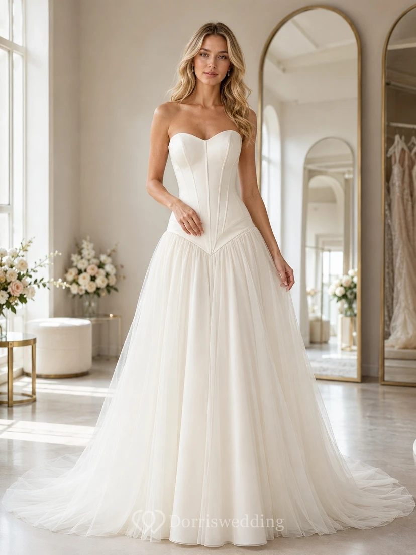 Vestido de novia sencillo, sin tirantes, estilo vasco, de corte A y largo hasta el suelo.