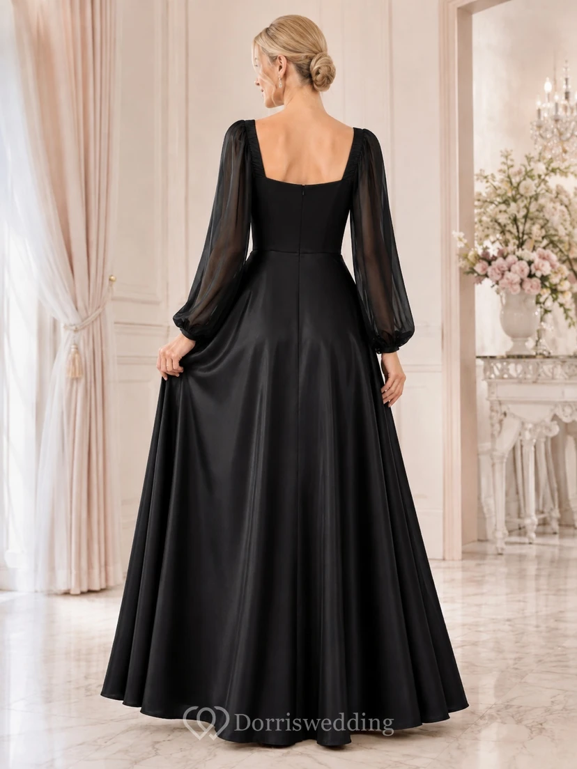 Robe longue noire sobre en satin, manches longues bouffantes, col carré et coupe trapèze. view 2