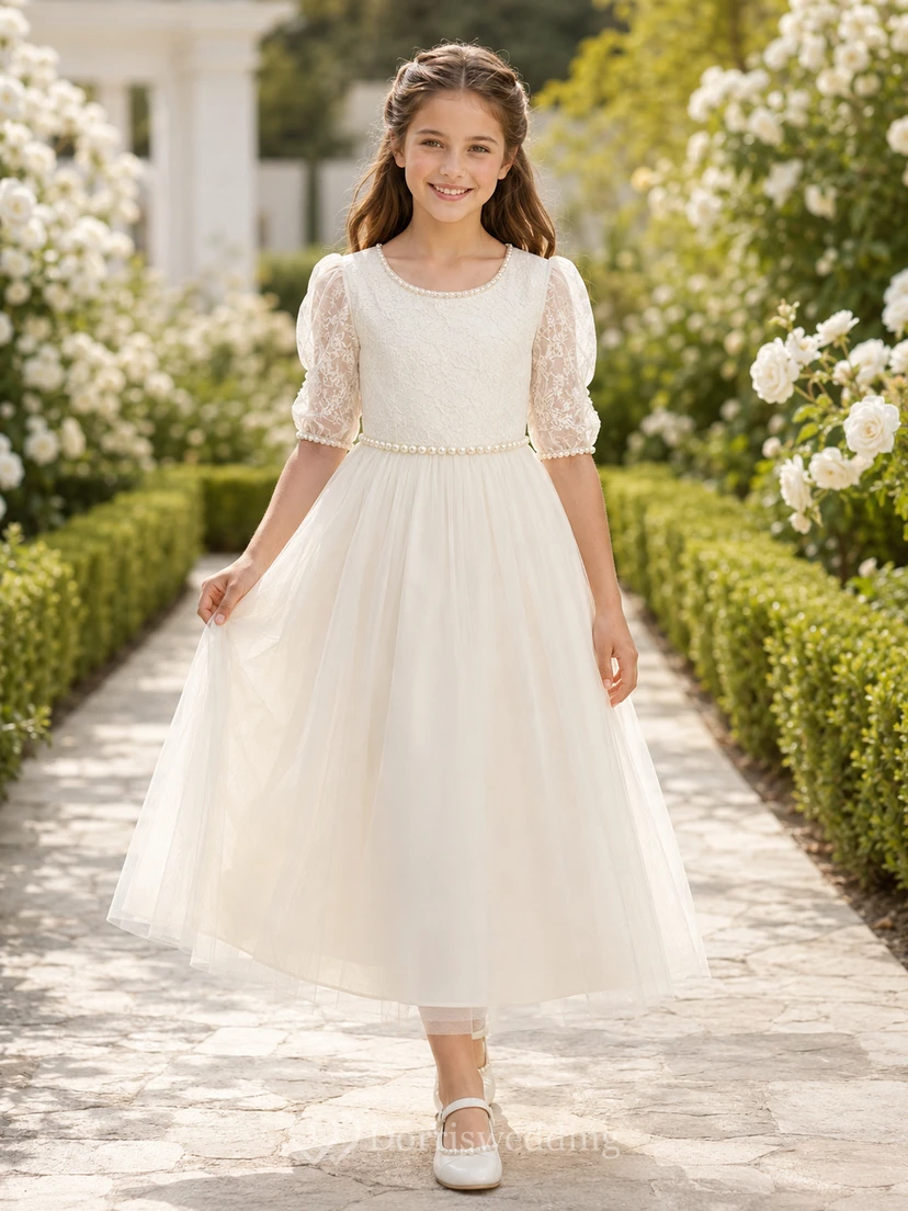 Vestido de comunión de niña de las flores, largo hasta la rodilla, con mangas abullonadas y espalda en V de encaje.