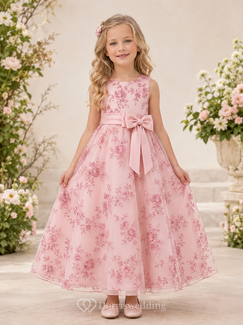 Robe de demoiselle d'honneur en organza à fleurs rose poudré, col rond, sans manches, double nœud, longueur cheville, coupe trapèze, sans manches, à col rond et nœud papillon.