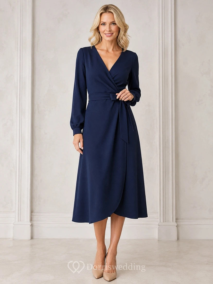 Vestido modesto de gasa azul marino con escote en V, manga larga y corte en A, largo hasta la rodilla.