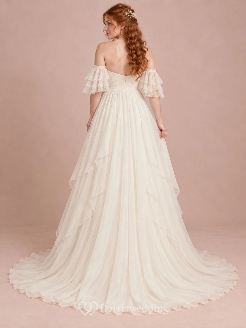 Vestido de novia largo estilo imperio con escote corazón, mangas superpuestas, gasa fruncida y caída en cascada. view 2