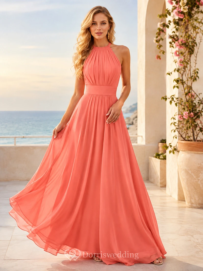 Robe de demoiselle d'honneur élégante en mousseline corail, dos nu, coupe empire, bustier, ornée d'un col halter.
