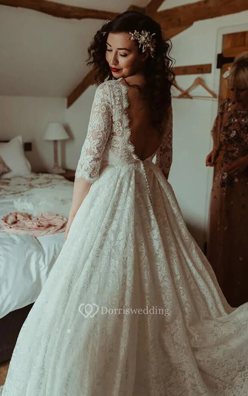 Vestido de novia modesto de corte A con escote redondo, mangas cortas y abertura en forma de ojo de cerradura. view 2