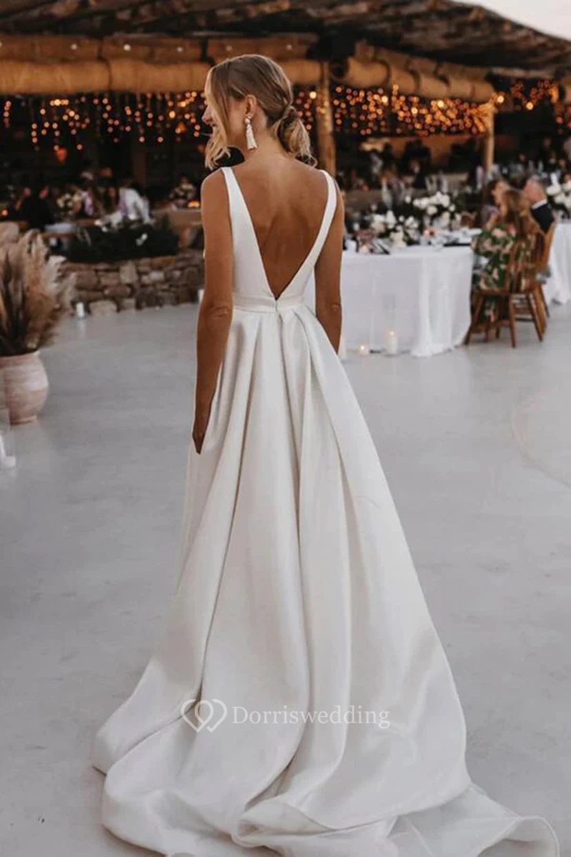 Elegante vestido de novia de gasa con escote en V y abertura frontal, a la moda y muy sexy. view 2