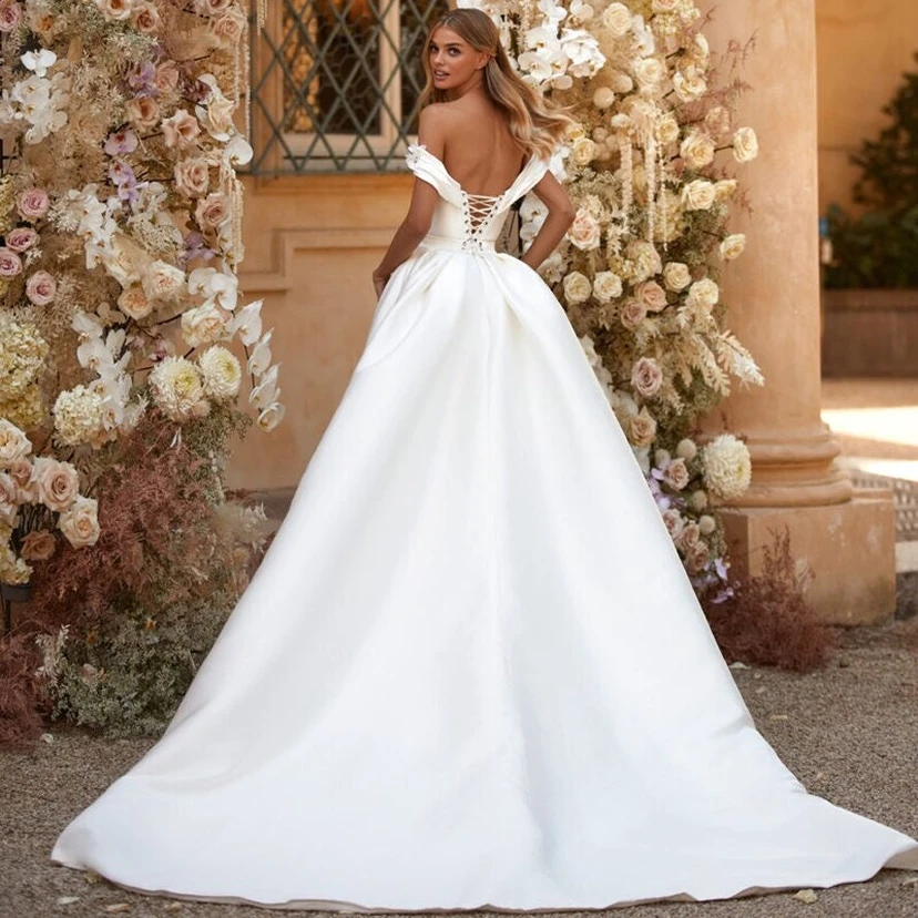 Off-the-shoulder Satin Sheath Ruched Wedding Dress with Flower and Watteau Train view 2