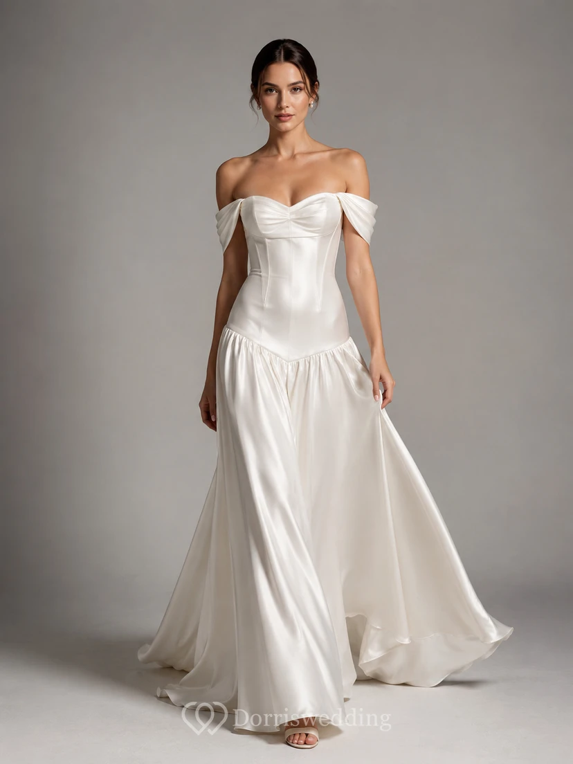 Robe de mariée moderne à épaules dénudées et taille basse, style corset, idéale pour une fugue amoureuse.