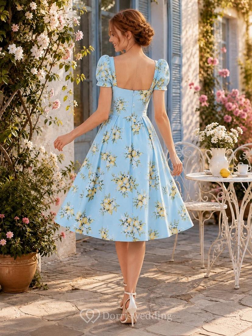 Vestido de gasa azul limón con estampado floral, cuello cuadrado, manga corta, corte en A y largo hasta la rodilla view 2