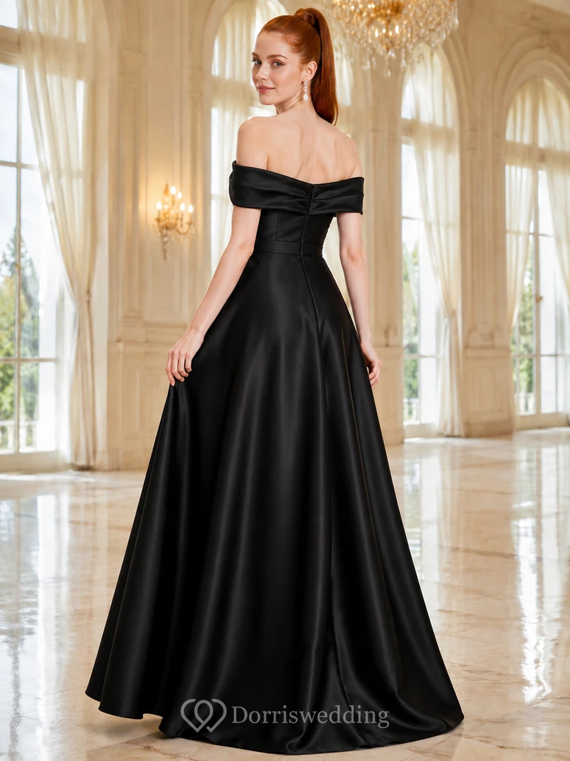 Vestido de gala negro de satén con hombros descubiertos y falda amplia. view 2