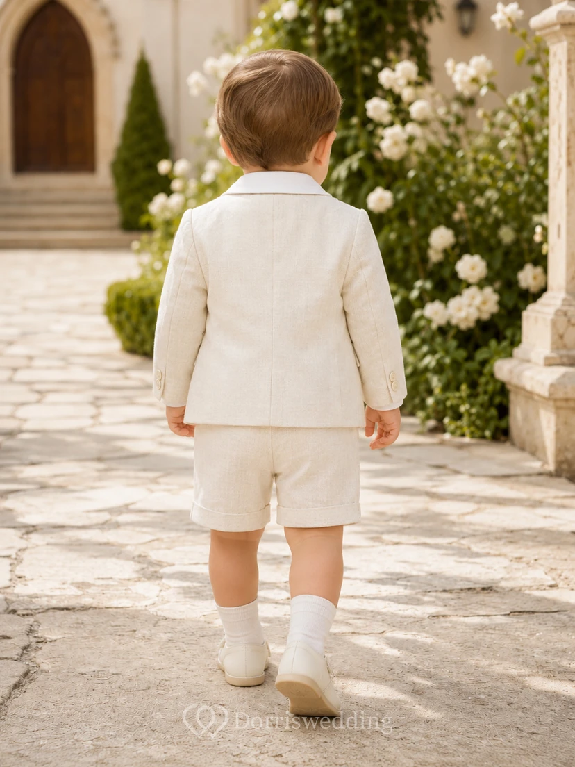 Traje corto formal de bautizo para bebé niño, tipo blazer color crema con pajarita. view 2