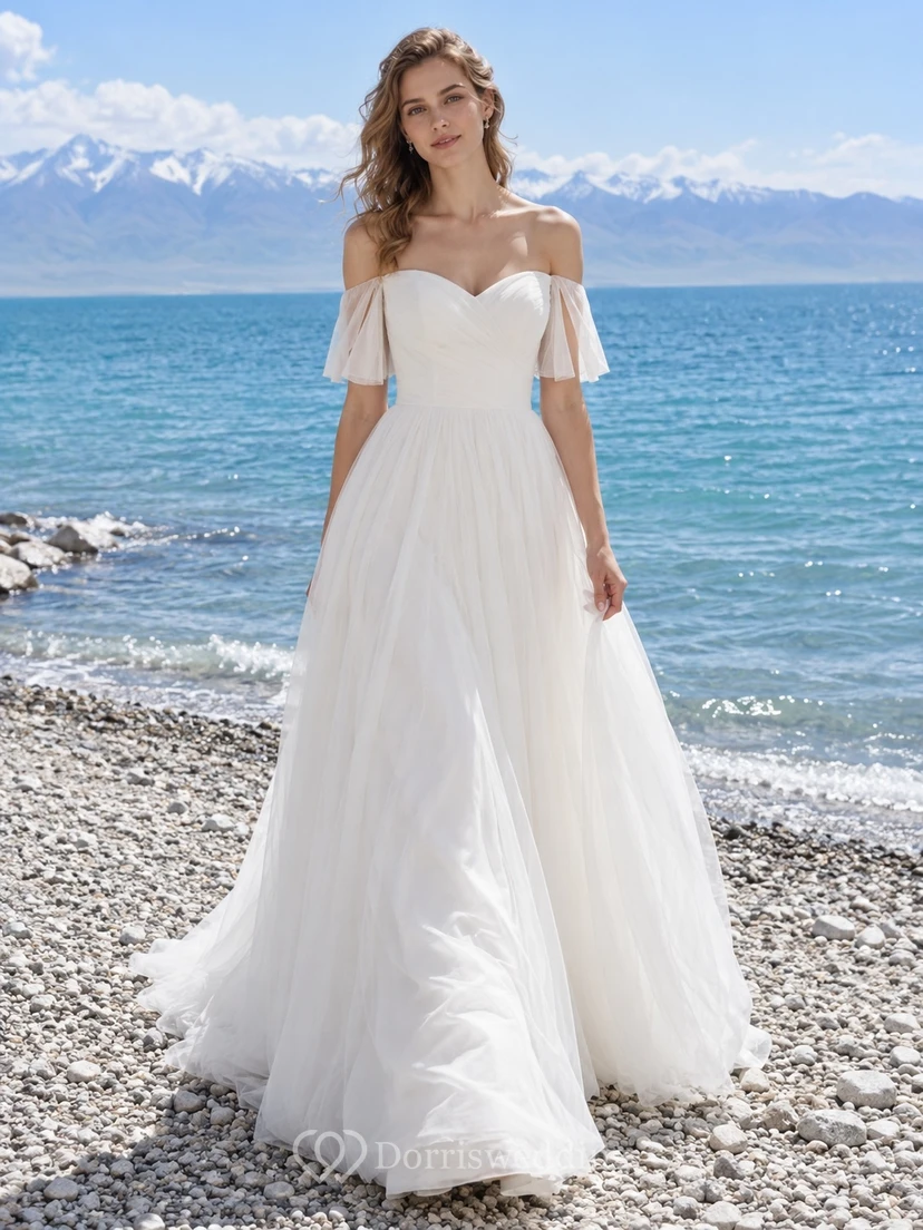 Vestido de novia sencillo de tul con escote corazón, mangas con volantes y hombros descubiertos