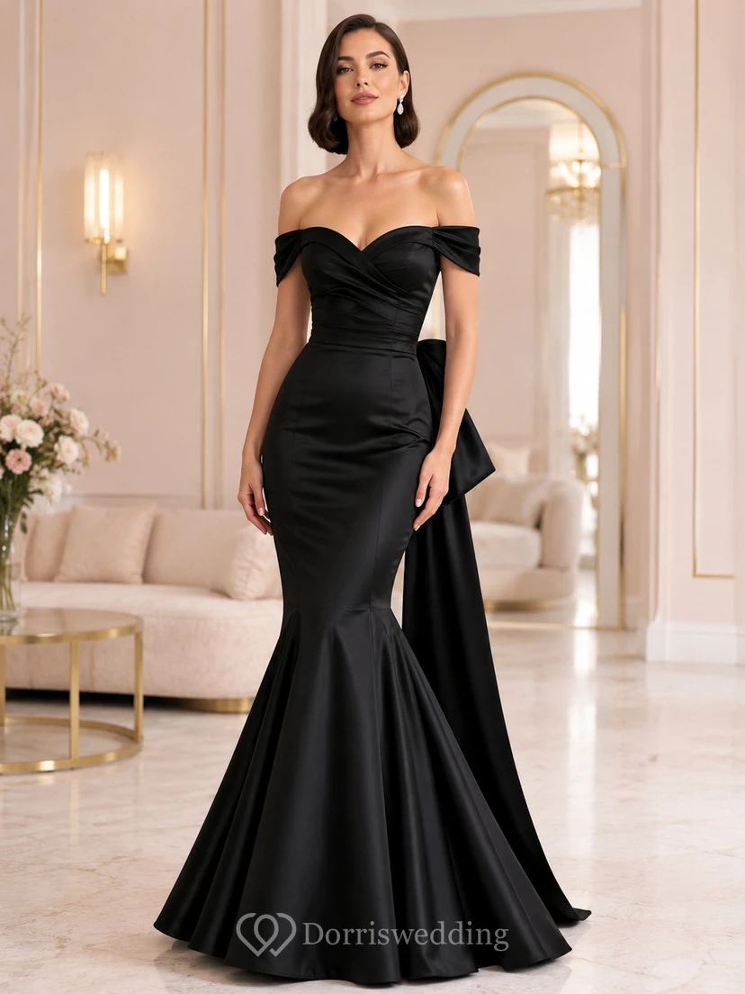Vestido de sirena negro con escote corazón, mangas cortas, lazo, drapeado, satén, cremallera y cola larga.