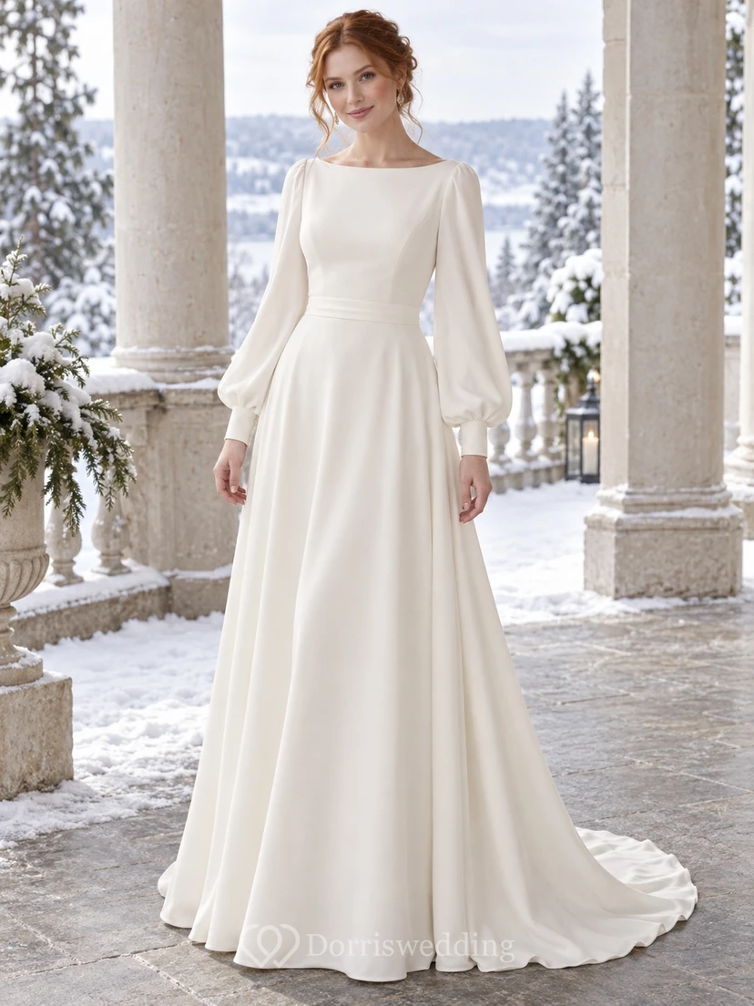 Vestido de novia de crepé con escote barco y cola larga, mangas obispo y corte en A