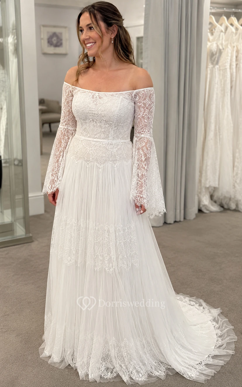 Robe de mariée ivoire à épaules dénudées, manches longues et dentelle à volants view 6