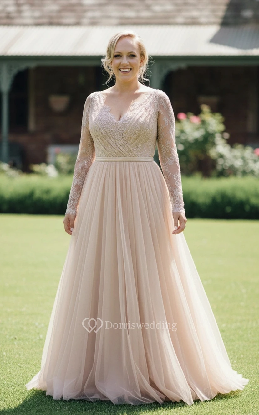Vestido de novia color rosa empolvado de manga larga con pedrería y voluminosa falda de tul en línea A. view 3