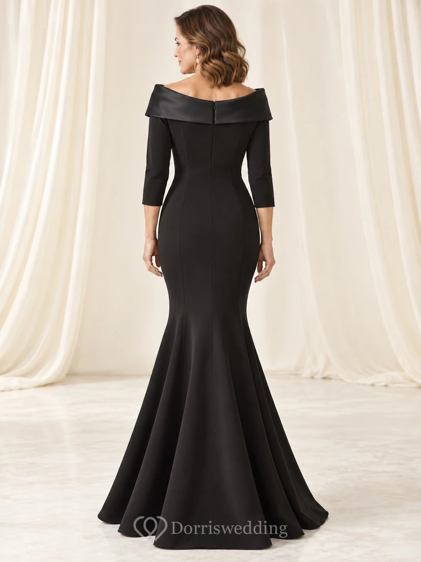 Vestido de noche formal negro estilo sirena, con escote palabra de honor, cuello ancho tipo retrato y mangas tres cuartos hasta el suelo. view 2