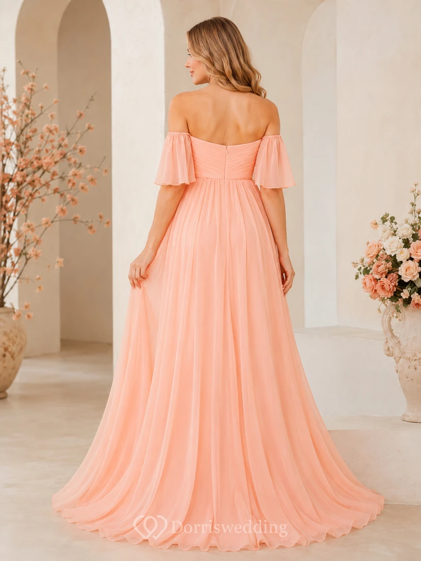 Robe de maternité pêche en mousseline de soie, épaules dénudées, décolleté cœur, coupe trapèze, longueur au sol, idéale pour une fête prénatale. view 2