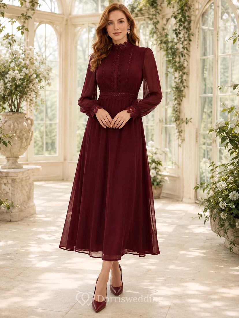 Vestido midi de gasa color burdeos con cuello alto y mangas estilo poeta para invitadas.