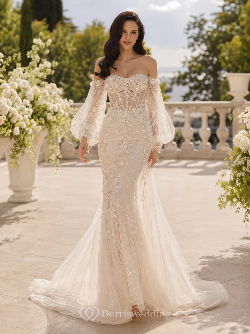 Robe de mariée sirène en dentelle diaphane, épaules dénudées, manches gigot, traîne chapelle, applications florales, style bal