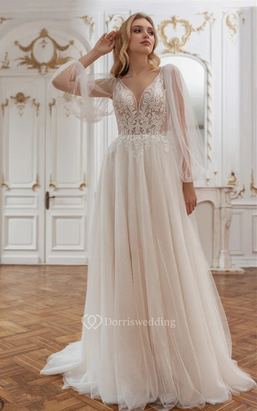 Robe de mariée vaporeuse à manches longues, coupe empire, plissée en dentelle, effet illusion empire, style vaporeux.
