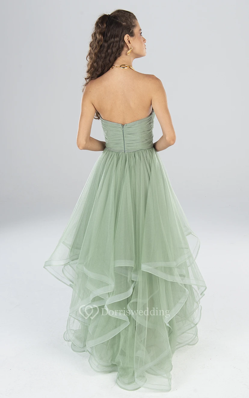 Robe de soirée élégante en tulle, longue sans manches, coupe trapèze, dos nu et volants view 2