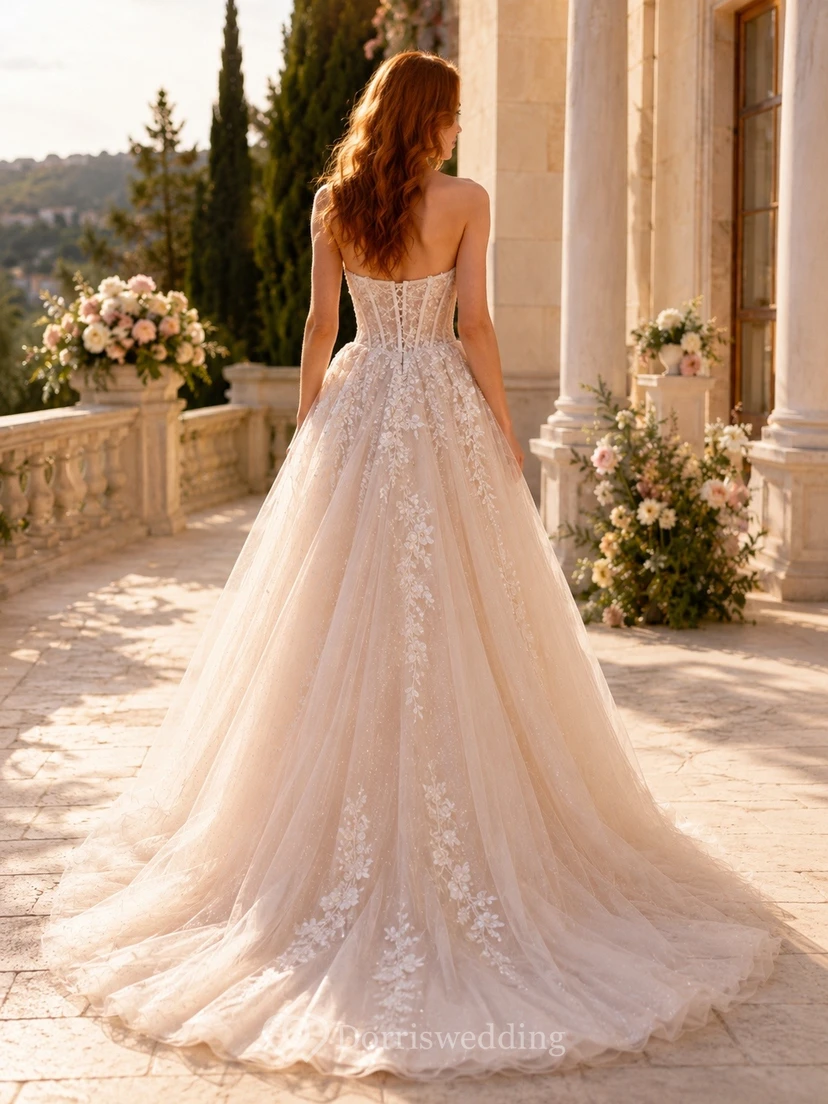 Vestido de novia largo sin tirantes de encaje y tul de lujo, corte en A, hasta el suelo. view 2
