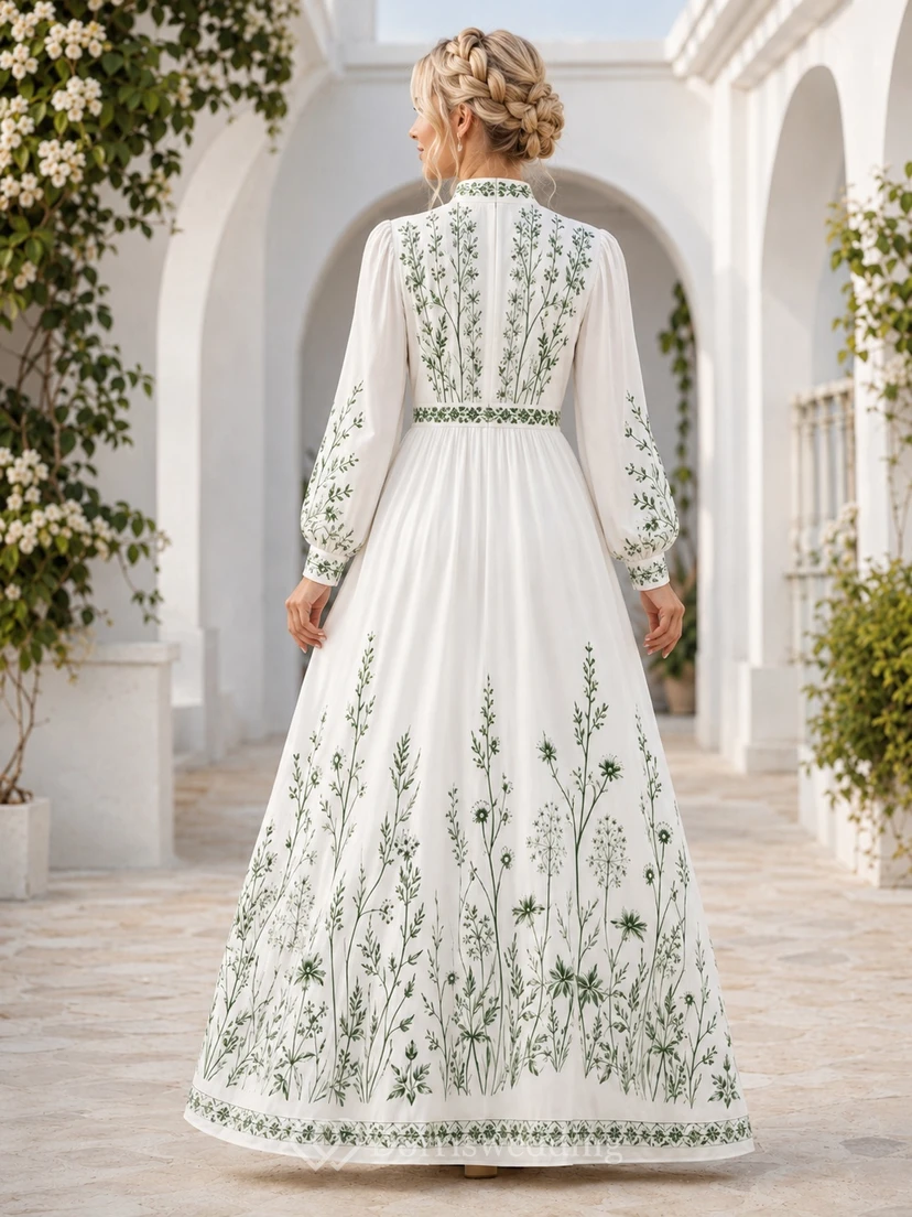 Robe d'invitée sobre, blanche et verte à fleurs, col montant, manches bouffantes longues, en satin, coupe trapèze, longueur au sol. view 2
