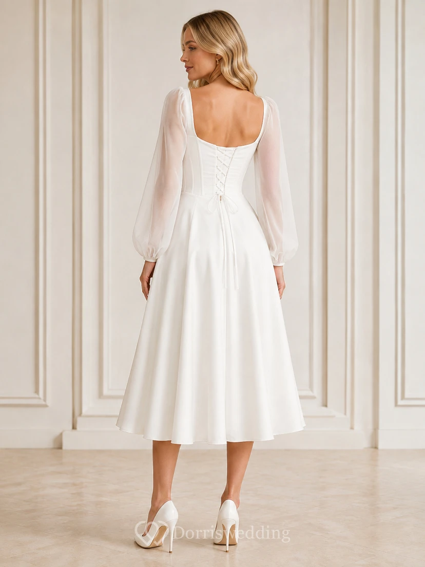 Vestido de gasa blanco de corte A, largo hasta la rodilla, con escote cuadrado y mangas abullonadas, estilo vintage romántico. view 2
