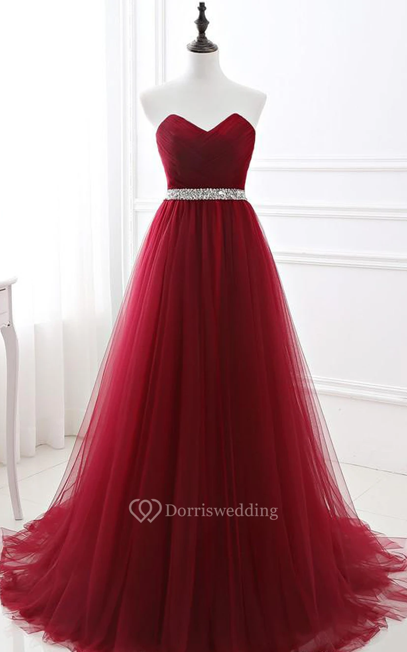 Robe de soirée romantique sans manches en tulle, longue jusqu'au sol, coupe trapèze, ornée de perles et de perles.