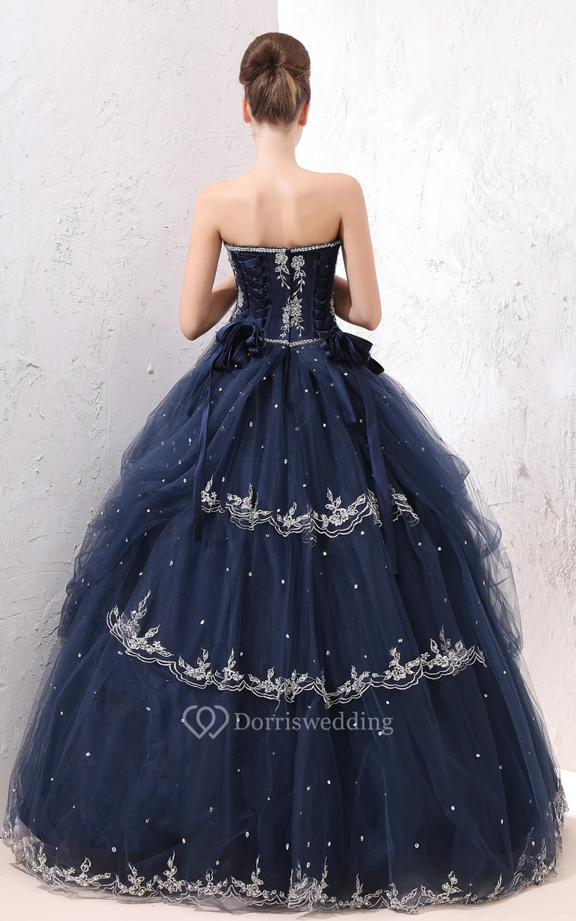 Exquisito vestido de gala de corte A con superposición de tul y apliques de encaje. view 3